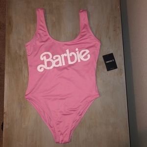 Pink barbie logo one piece swim suit.